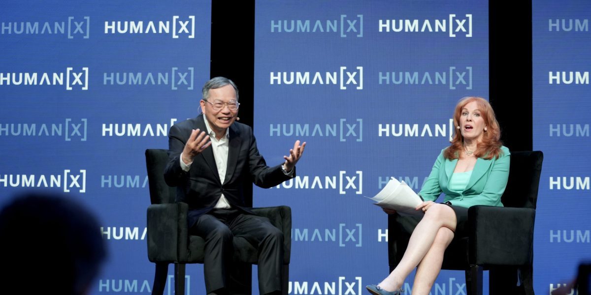 Supermicro CEO Charles Liang on the HumanX mainstage, photographed by Big Event Media