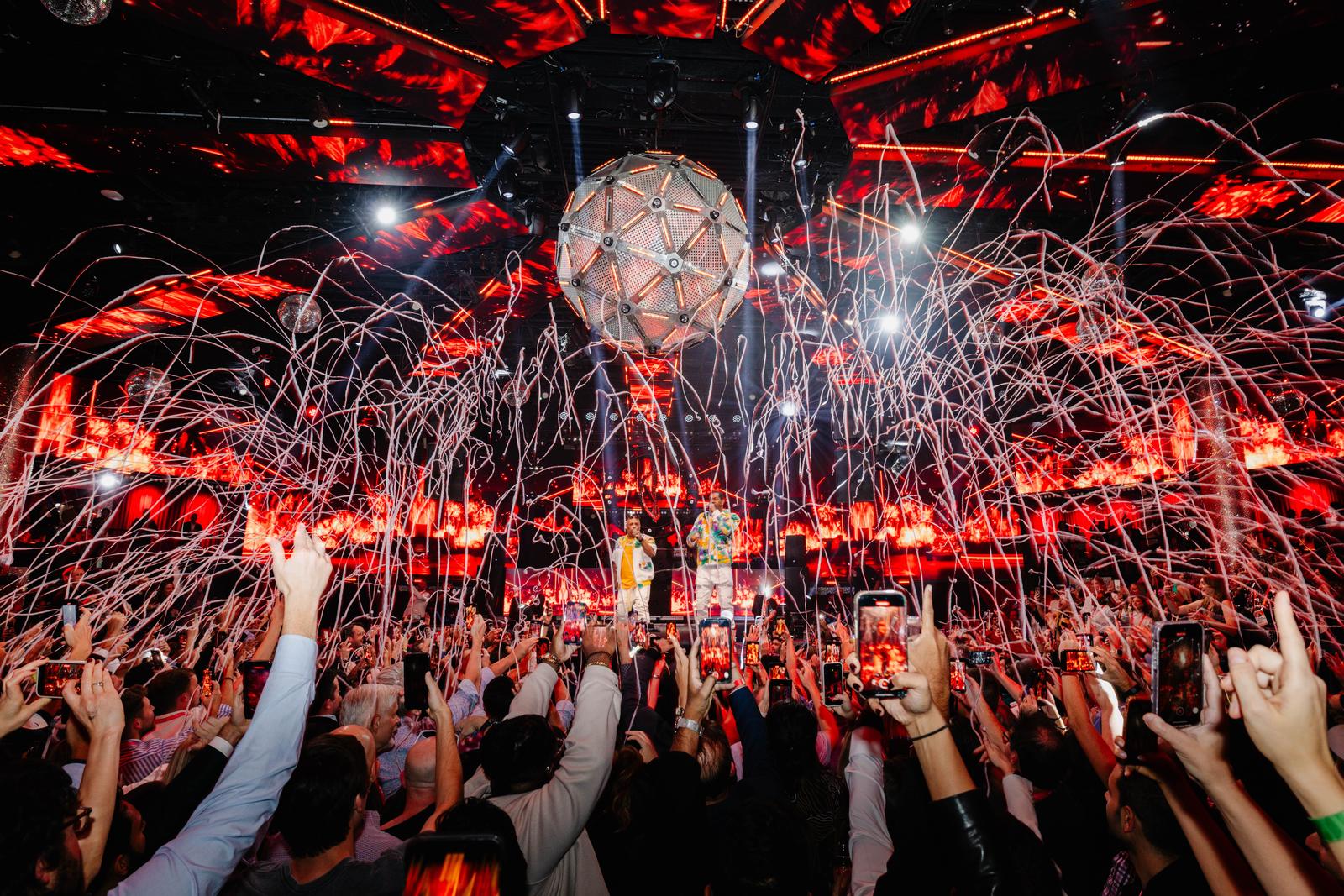 Streamers over the crowd at an HLTH performance
