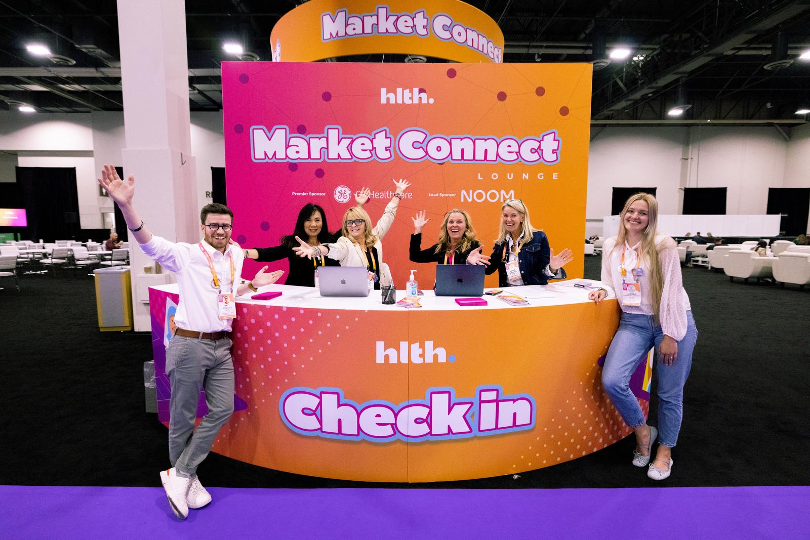 HLTH Market Connect team welcoming attendees