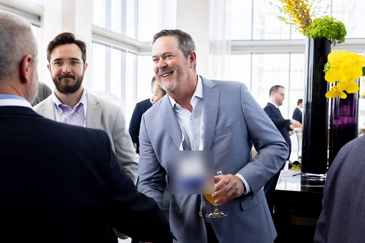 Candid networking at the sponsor reception