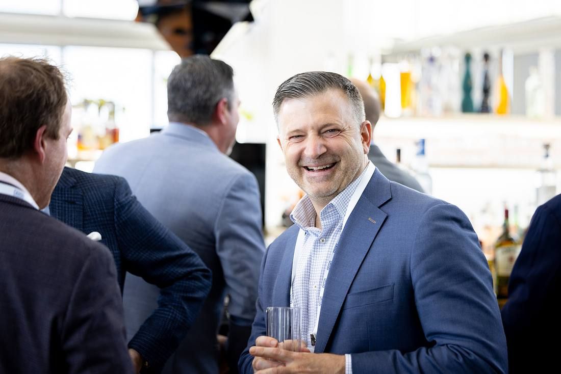 Guest laughing at the sponsor reception